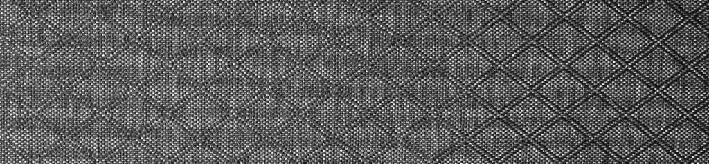 Best sling bag featuring ripstop nylon with geometric diamond pattern and gray textured background.