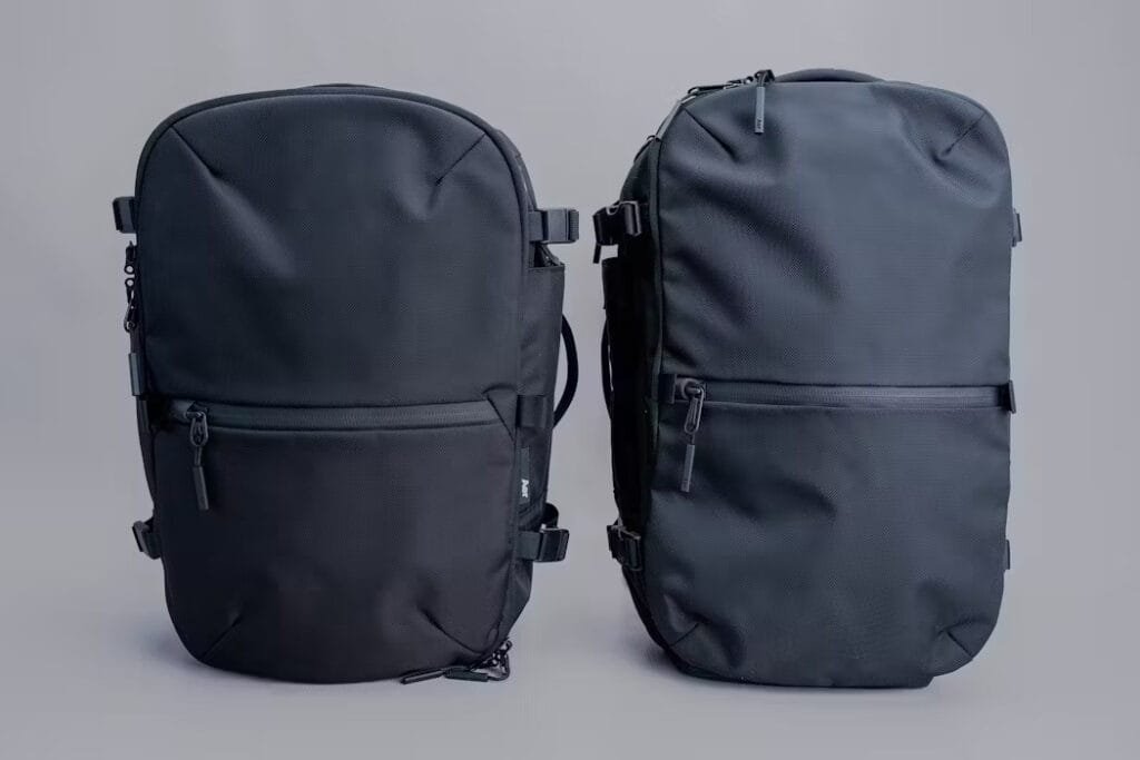 Best travel backpack comparison showcasing Aer Travel Pack 3 and Travel Pack 2 in sleek, minimalist design.