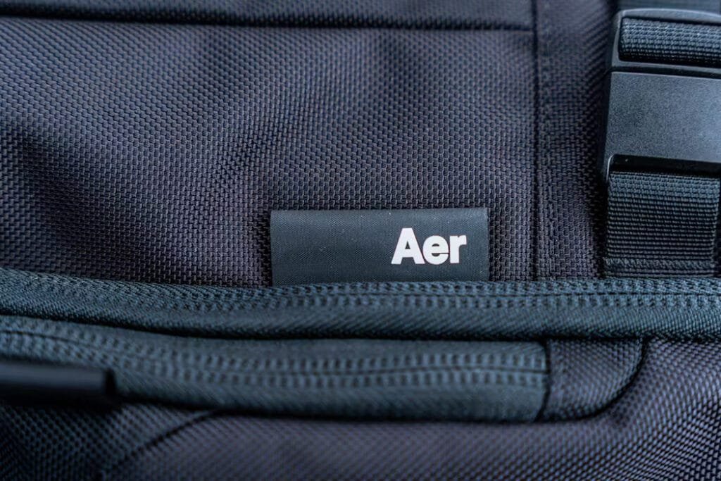 Best travel backpack close-up of Aer Travel Pack 3 featuring ballistic nylon fabric and sleek design.
