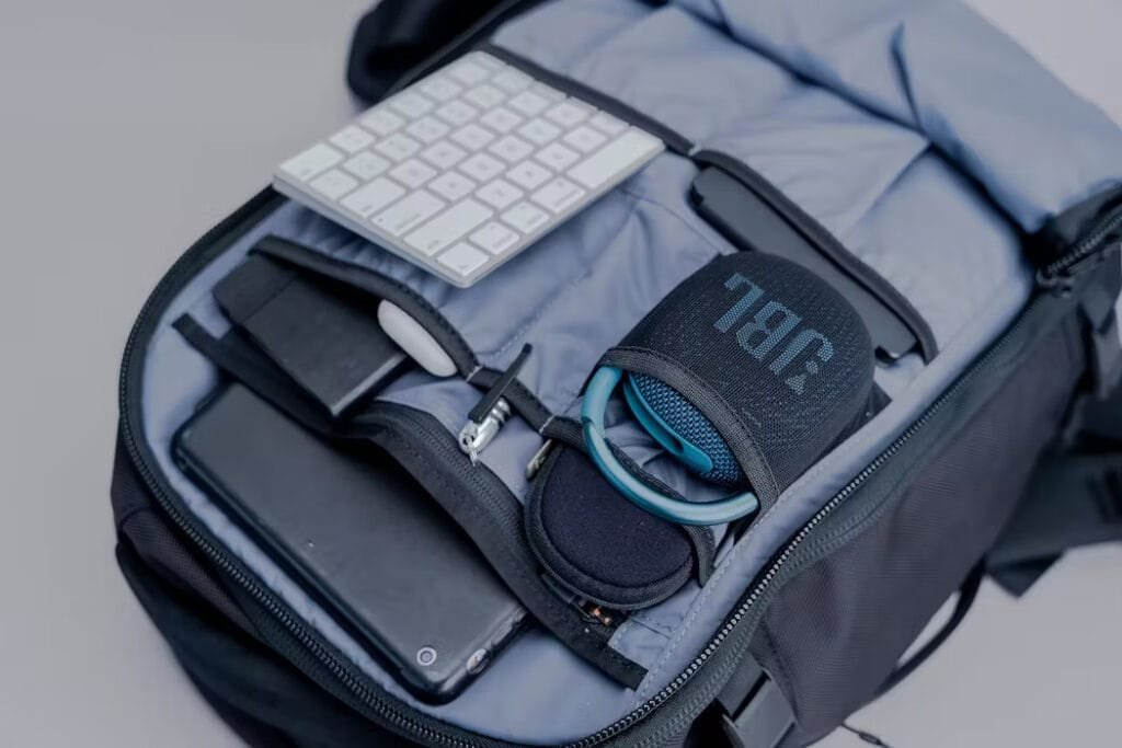Best travel backpack organized with Aer Travel Pack 3 showcasing tech gadgets and accessories for professionals.