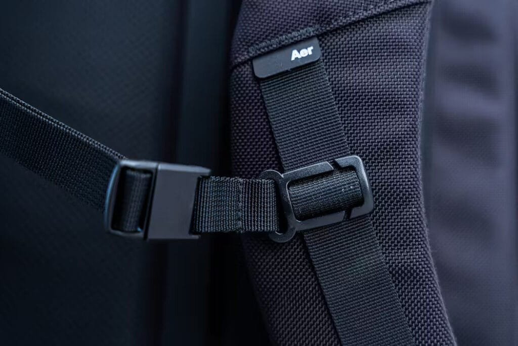 Best travel backpack close-up showcasing Aer Travel Pack 3s durable fabric and secure sternum strap.