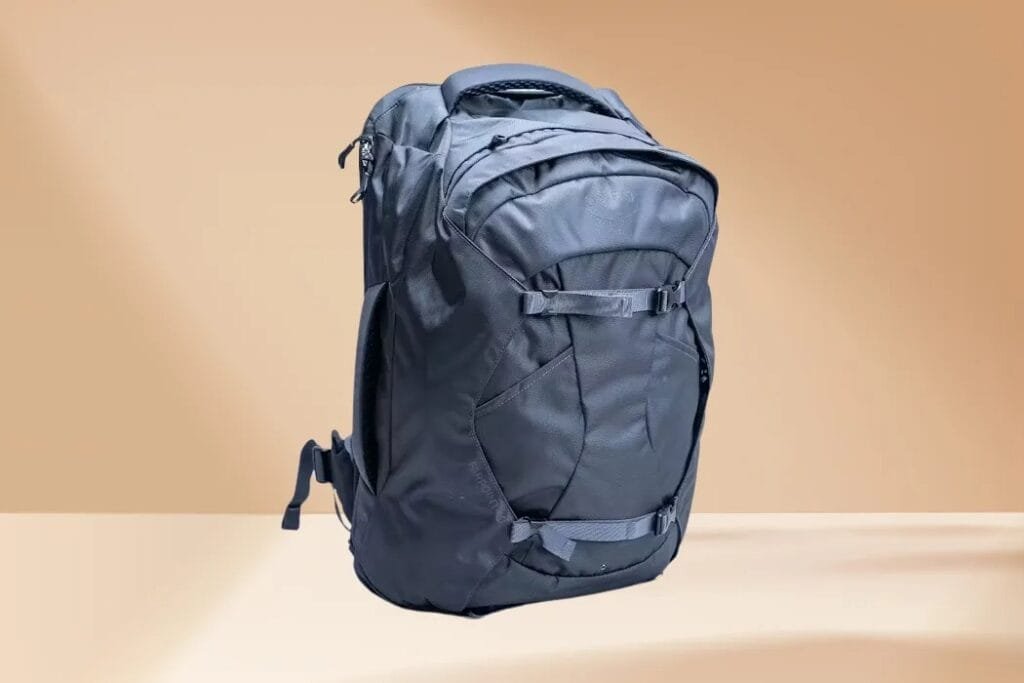 Osprey Farpoint 40 backpack review showing durable, water-resistant gray design with pockets and straps.