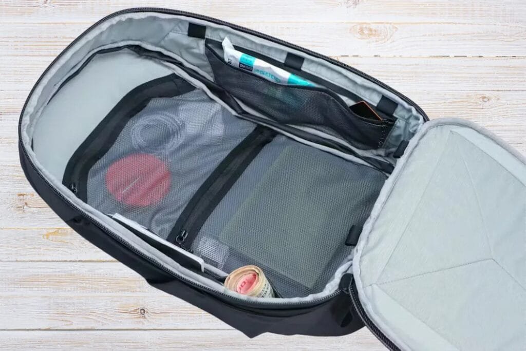 Peak Design Travel Backpack 30L spacious main compartment and organized mesh pockets for efficient packing.